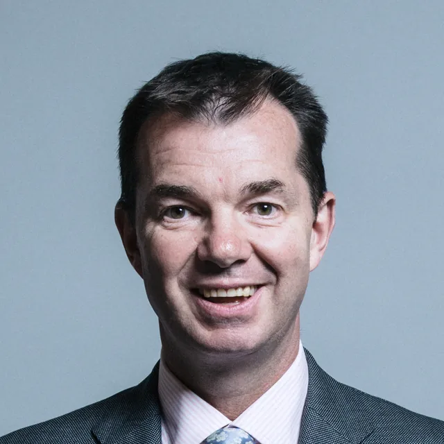 Portrait of Guy Opperman